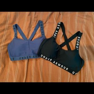 2 pairs of Under Armour racer back sports bras